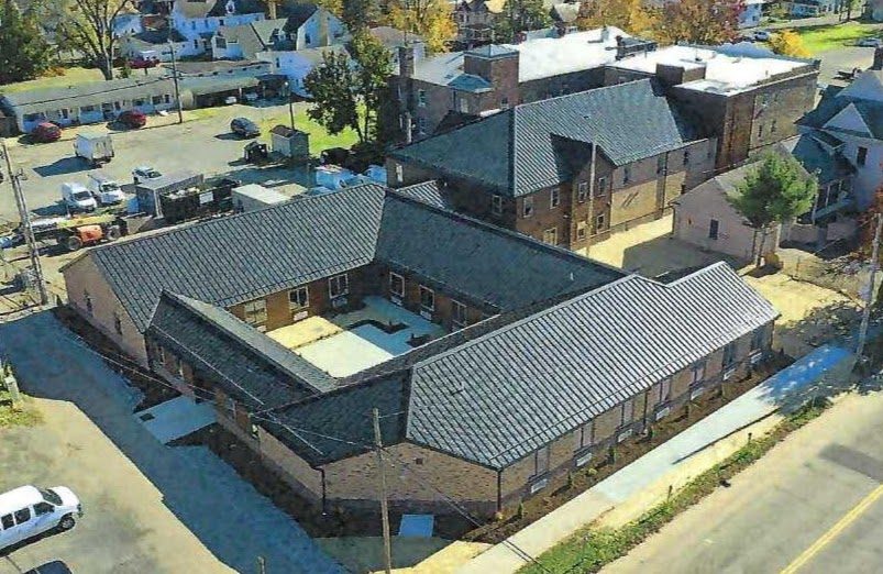 Aerial view of the building and courtyard