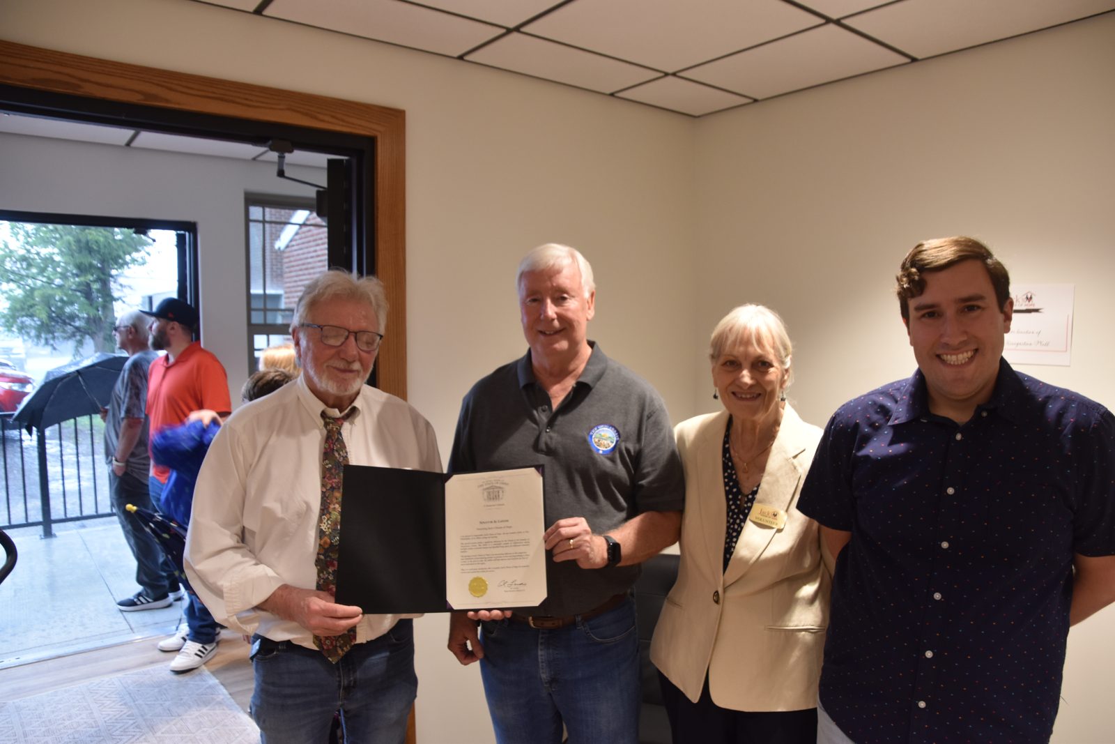 Board members receive a proclamation